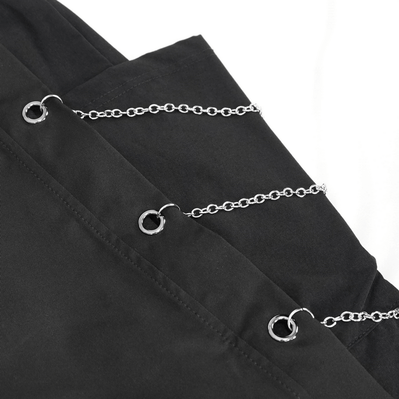 Close-up of black cargo pants featuring stylish chain eyelets for a trendy punk look.