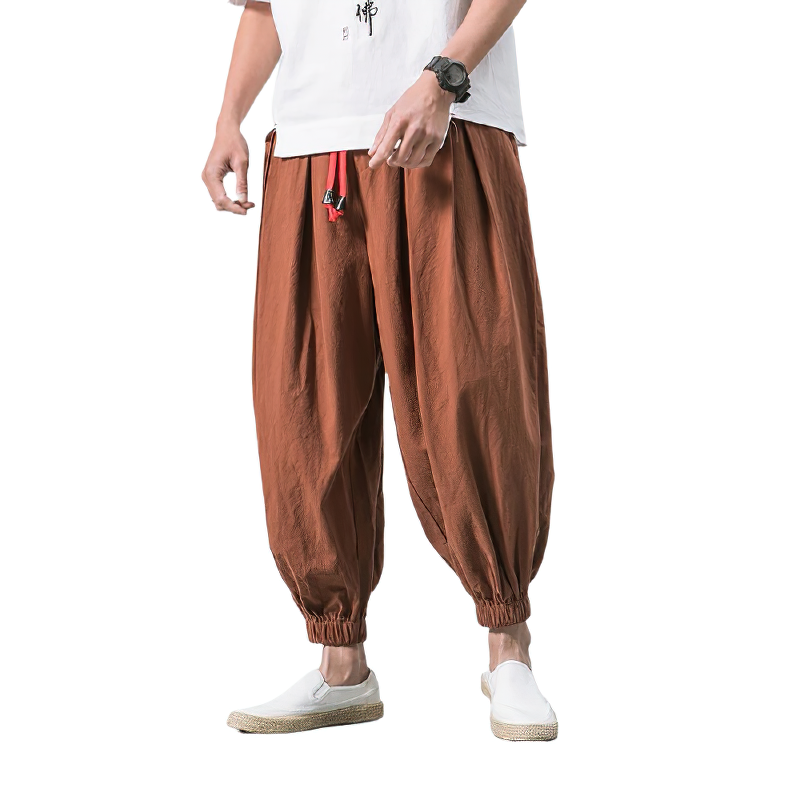 Casual men's loose cotton linen pants in brown, perfect for summer urban style outfits.