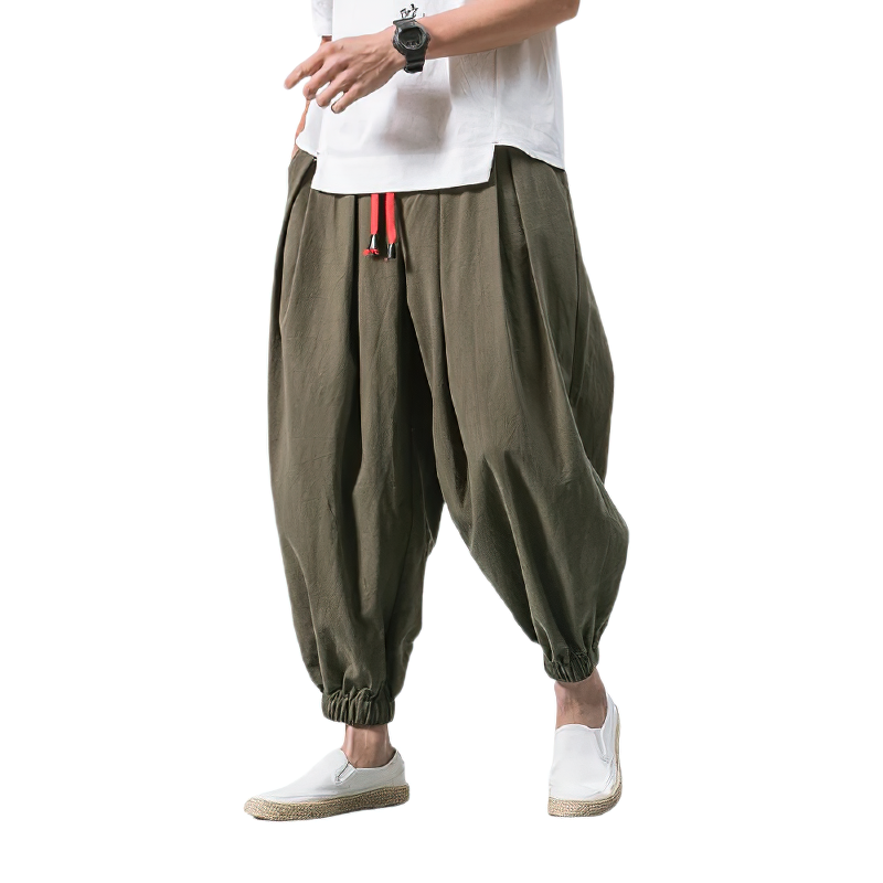 Casual men wearing loose cotton linen pants in olive green, perfect for summer style and comfortable daily looks.