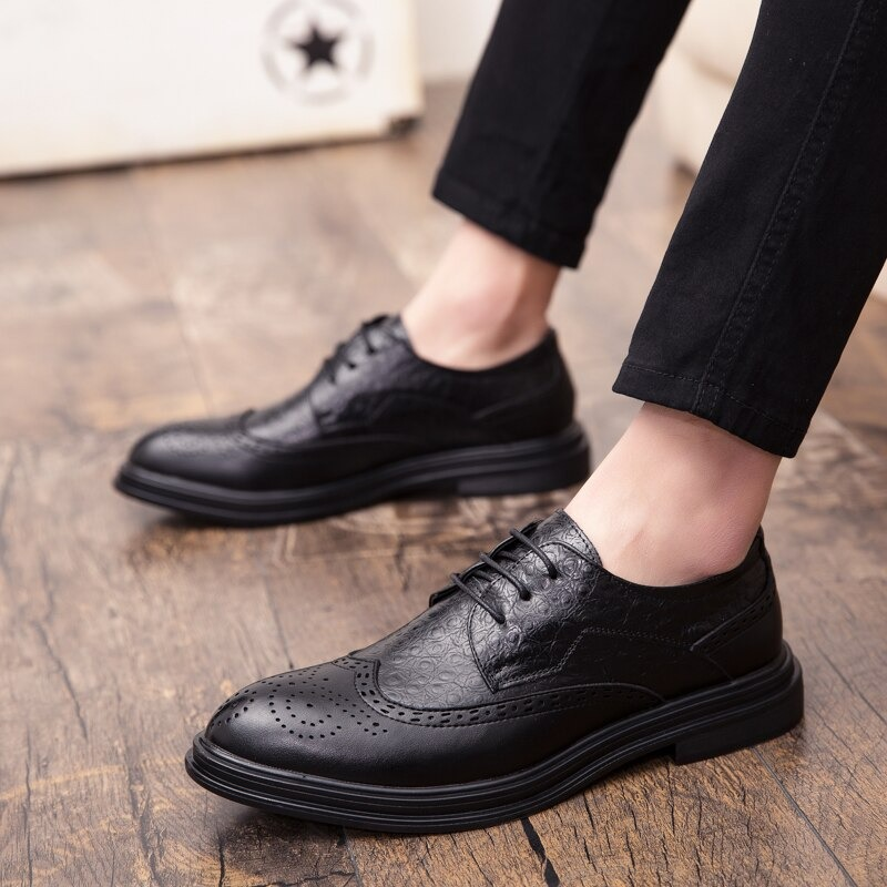 Fashion male genuine leather derby shoes in black, showcasing modern design and stylish casual look.