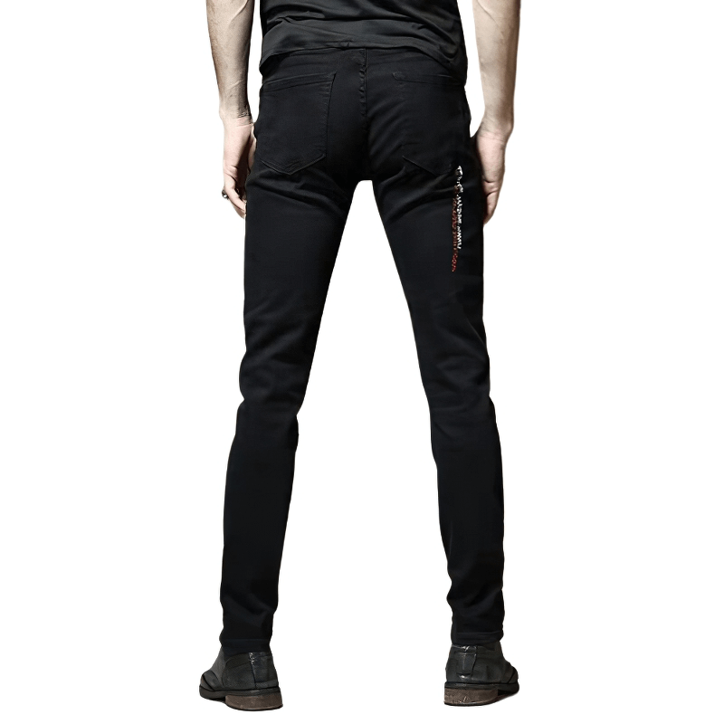 Stylish male model showcasing back view of slim black jeans with trendy letter print design.