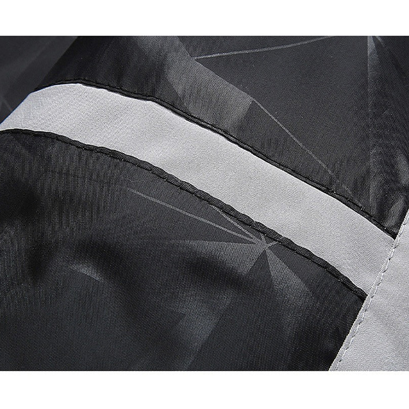 Close-up of the stylish stitching and fabric details on the men's zip-up jacket, highlighting its quality finish.