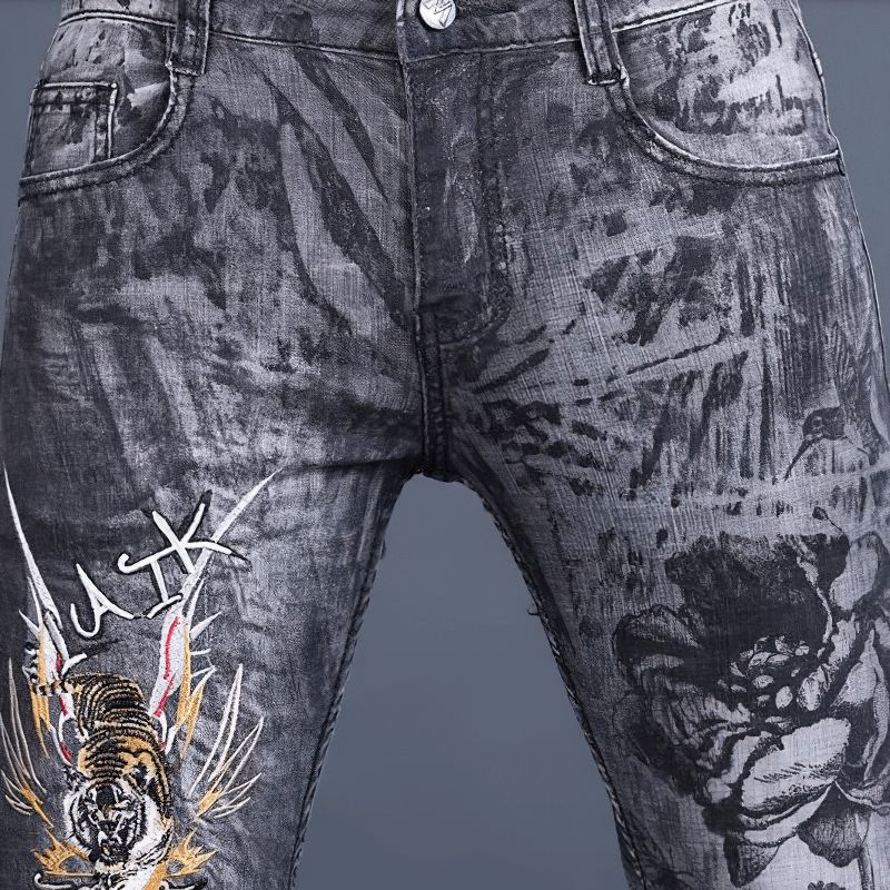 Fashion men's skinny jeans with tiger and floral embroidery, stylish casual denim pants, comfortable stretch material.