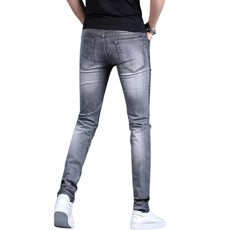 Men's skinny jeans with embroidery, showcasing a casual style and snug fit, perfect for comfortable everyday wear.