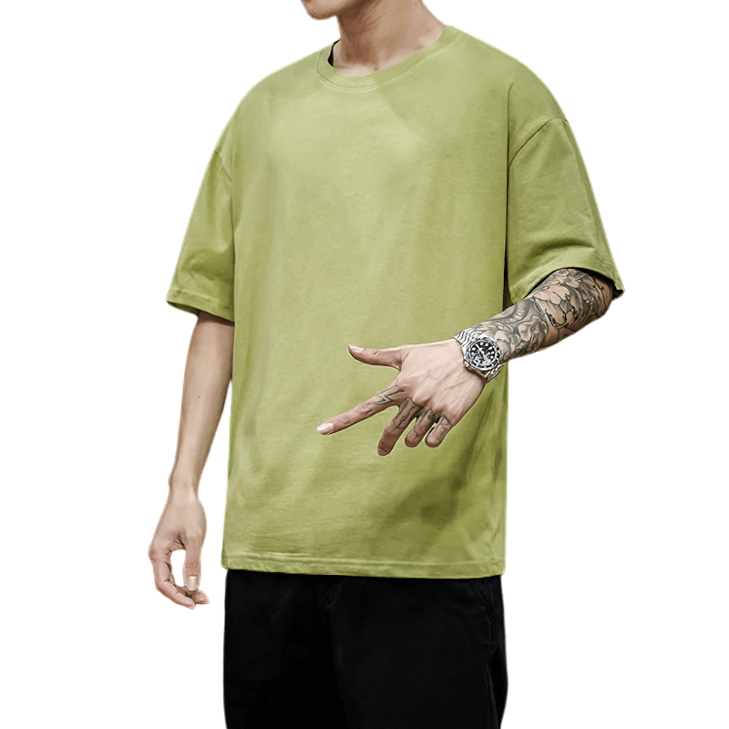 Stylish men's loose cotton t-shirt in light green, perfect for alternative casual fashion and comfortable wear.