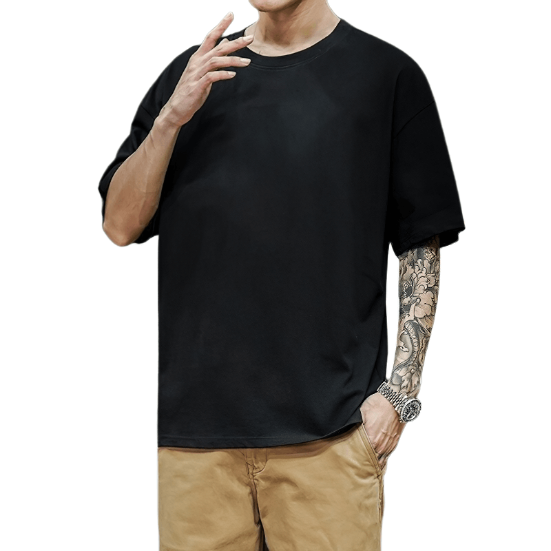 Men's black cotton loose t-shirt featuring a stylish oversized fit, perfect for casual and alternative fashion.