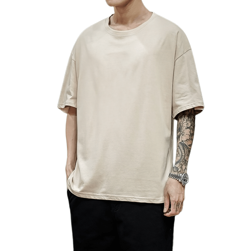 Men's oversized cotton t-shirt in beige, featuring loose fit and trendy style, ideal for comfortable casual wear.