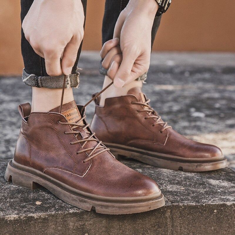 Stylish men's ankle leather boots in brown, perfect for casual wear, featuring non-slip sole and British design.