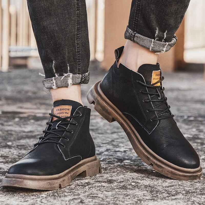 Men's fashion ankle leather boots in black, featuring a stylish British design and casual non-slip rubber soles.