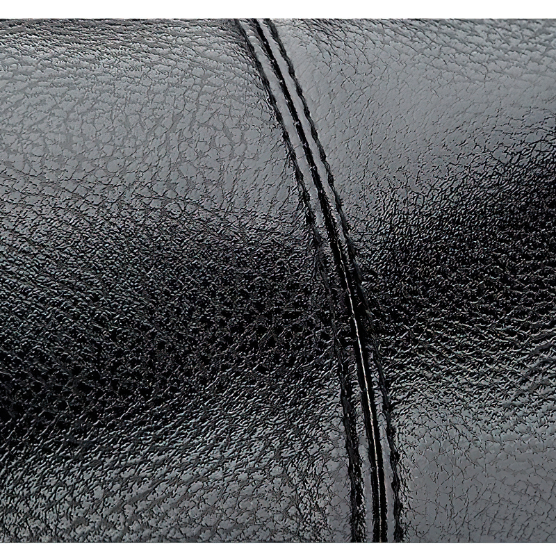 Close-up of black PU leather texture showcasing quality stitching and durability.
