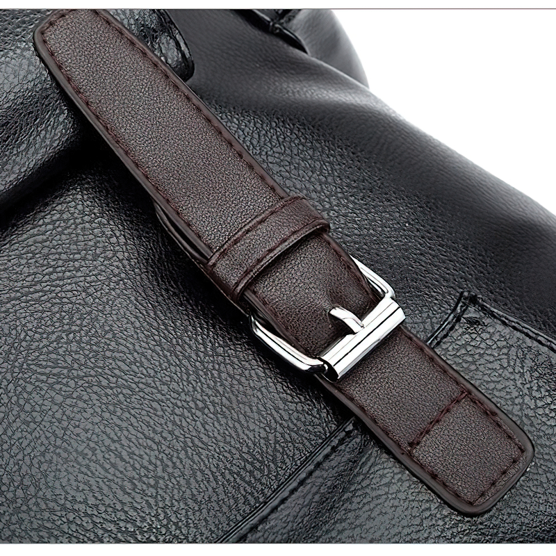 Close-up of the buckle detail on a men's black PU leather backpack, showcasing its sleek design.