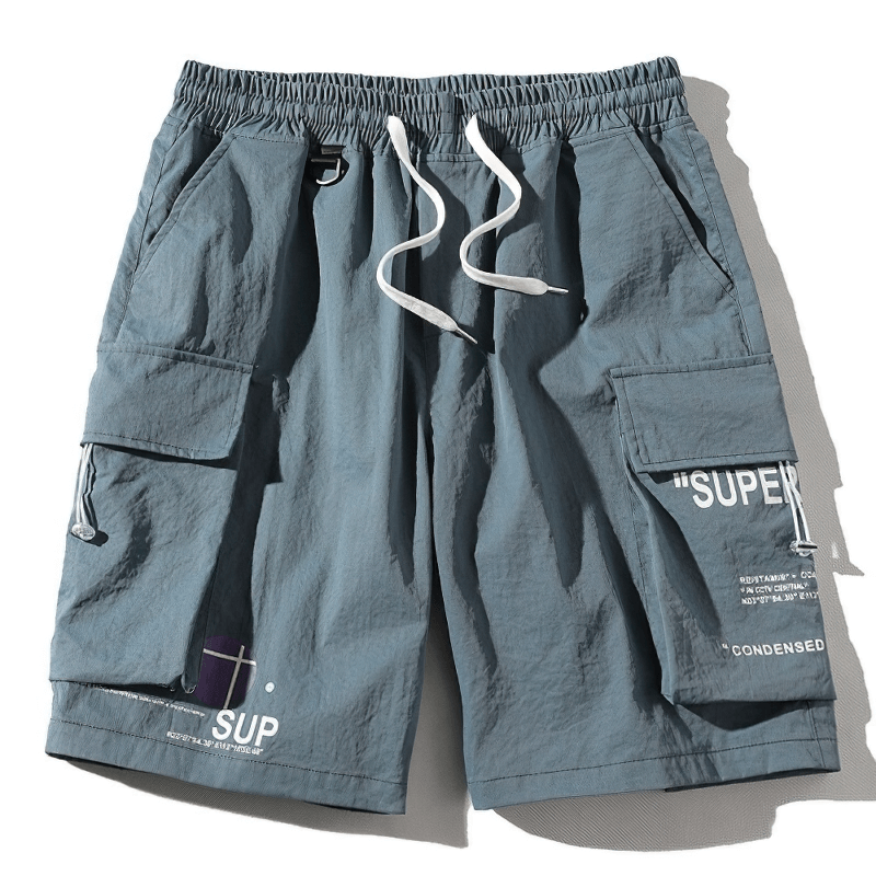 Men's trendy blue elastic waist shorts with multi-pockets, perfect for casual everyday wear.