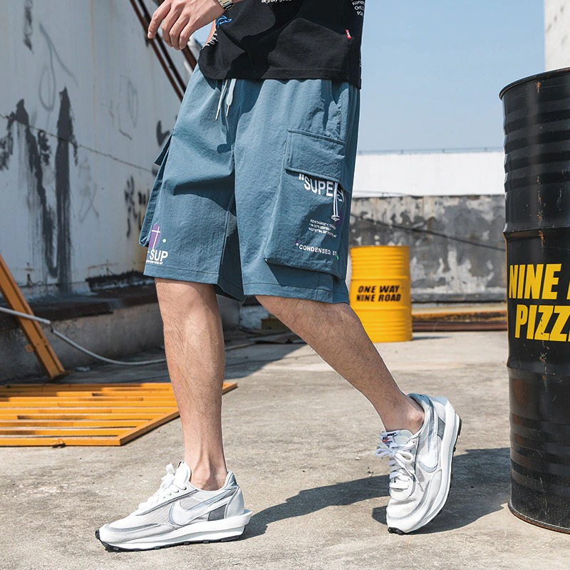 Men's stylish elastic waist shorts with pockets, perfect for casual outings and everyday wear.