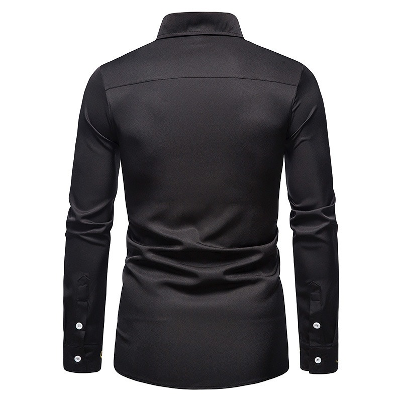 Back view of a men's black asymmetric long-sleeved cotton shirt, showcasing stylish button details.