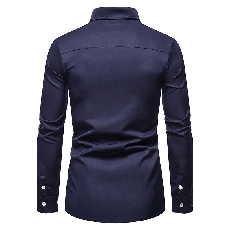 Back view of a men's asymmetrical long-sleeved shirt in navy blue, showcasing its elegant and breathable design.