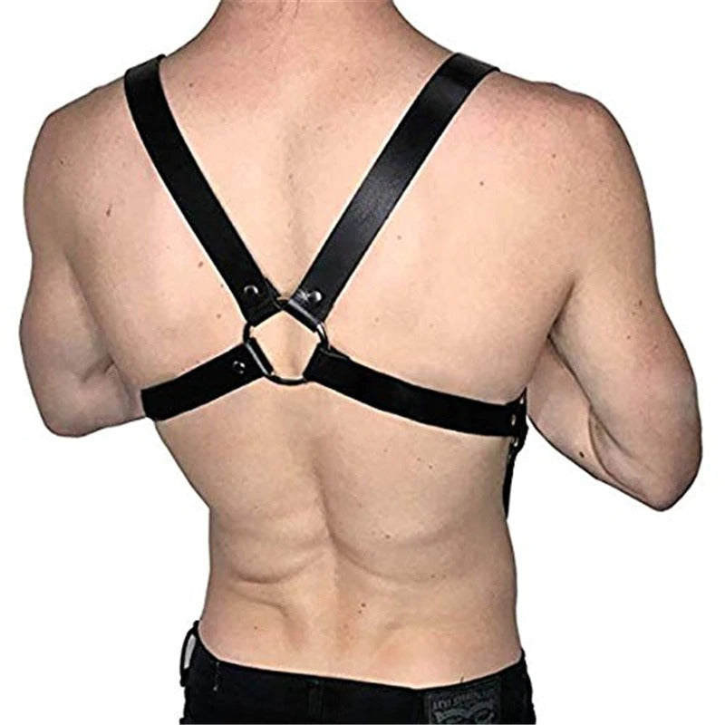 Stylish men's leather harness with metal clips, showcasing adjustable straps on a model's back.