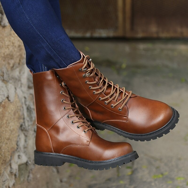 Men's brown high top combat boots made of genuine leather, featuring sturdy laces and durable sole for modern military style.