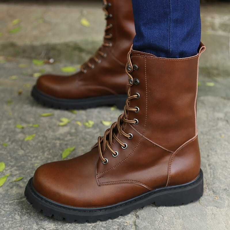 Men's high top military combat boots in brown leather, perfect for casual and stylish outfits.