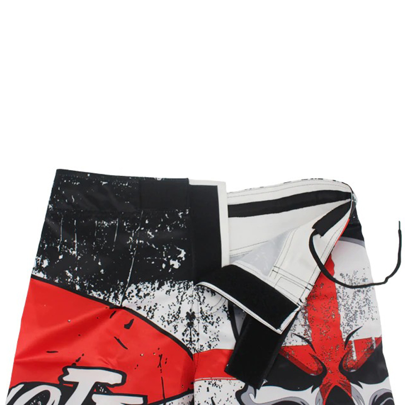 Fashion men's shorts with skull print, showcasing vibrant red and black design, perfect for training and casual outings.