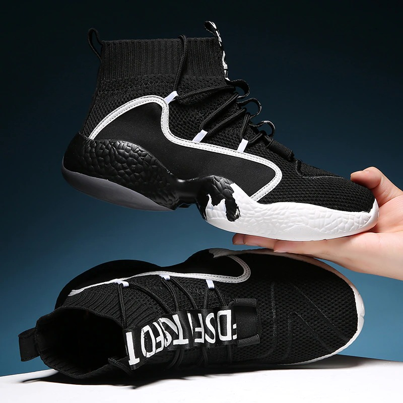 Stylish black lace-up men's sneakers with breathable knit upper and light sole for comfort and casual wear.