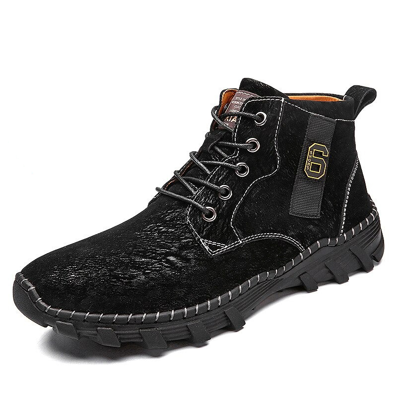 Stylish black men's leather boots with rubber sole and lace-up design for casual wear.