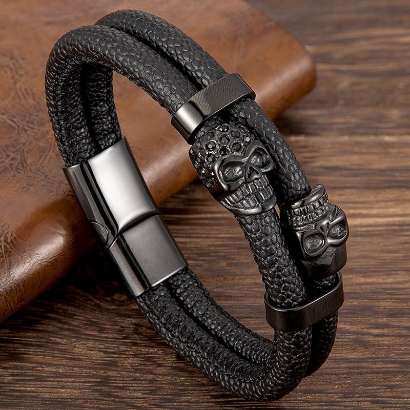 Stylish men's black leather bracelet with skull magnetic clasp, perfect for punk fashion enthusiasts.