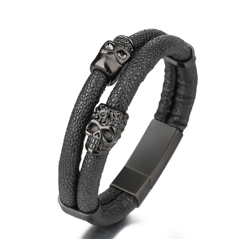 Men's punk style black leather bracelet with skull magnetic clasp, trendy gothic jewelry for fashion enthusiasts.