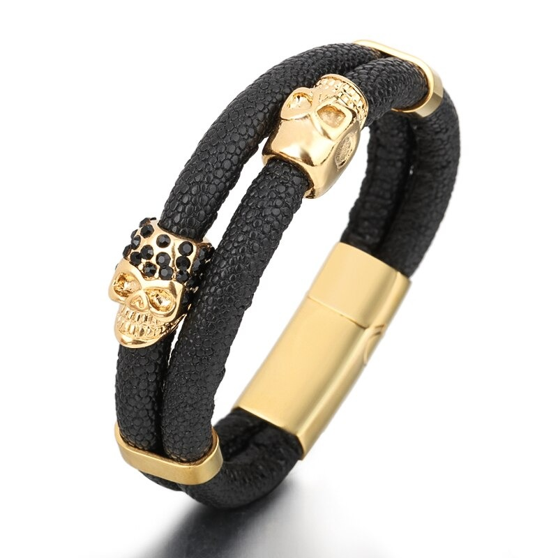 Fashionable men's skull bracelet with stainless steel magnetic clasp, crafted from genuine leather in punk style.