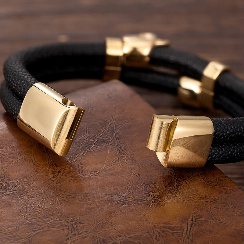 Stylish men's leather bracelet with gold magnetic clasp and punk design, perfect for adding edge to any outfit.