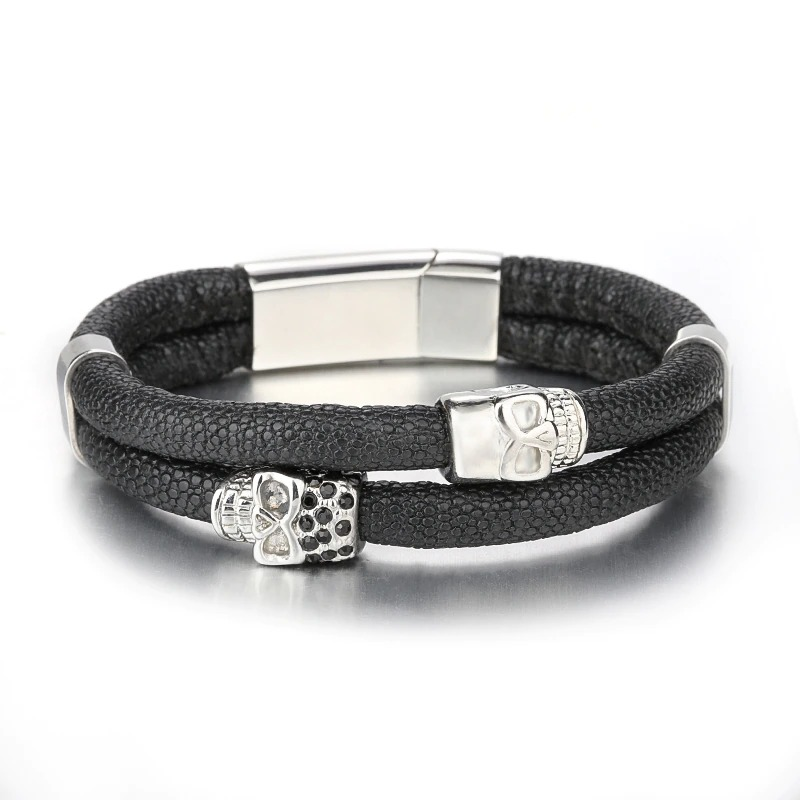 Fashion men's stainless steel skull bracelet with leather, perfect for punk style enthusiasts.