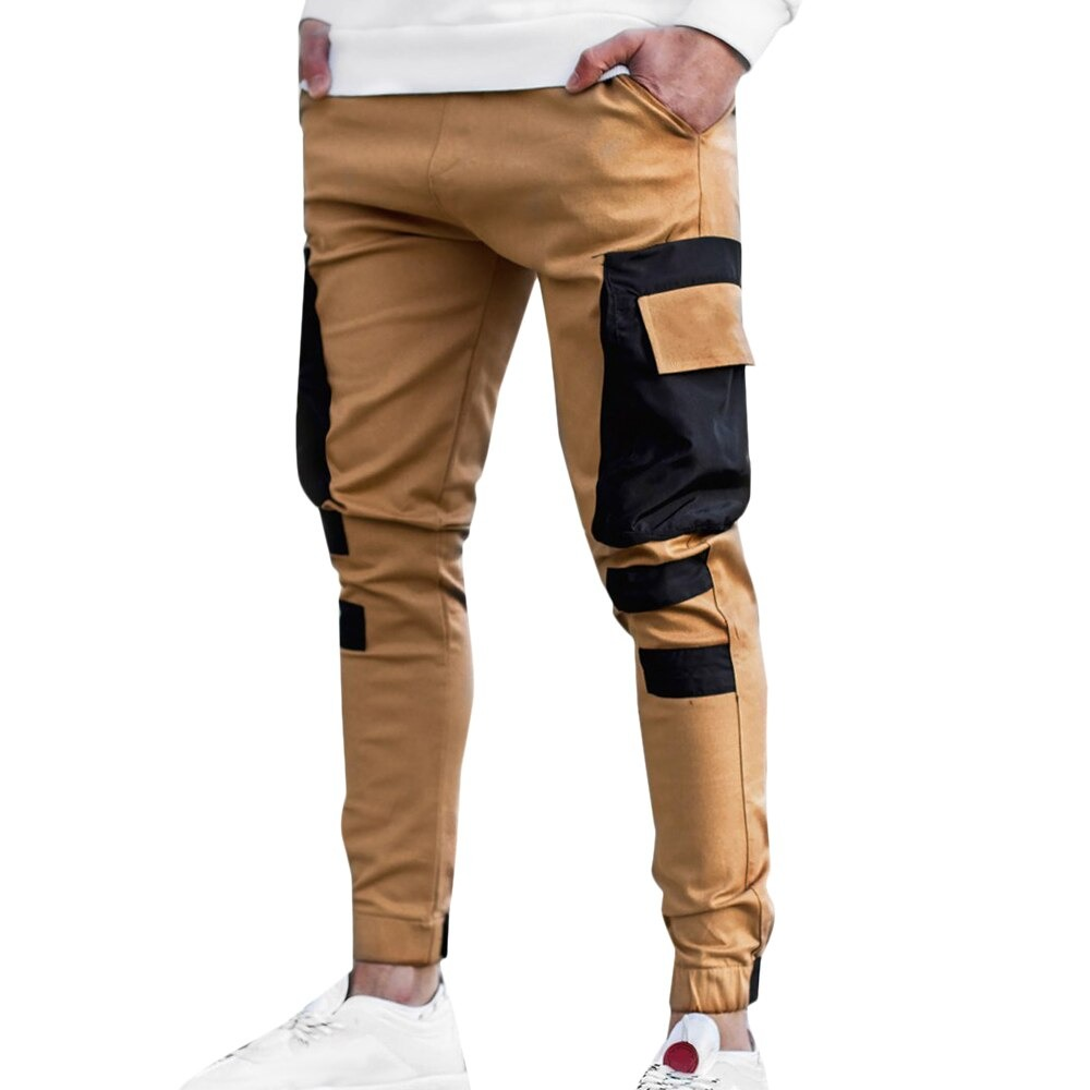 Fashionable men's jogger pants in tan with black patch pockets, perfect for casual streetwear style.