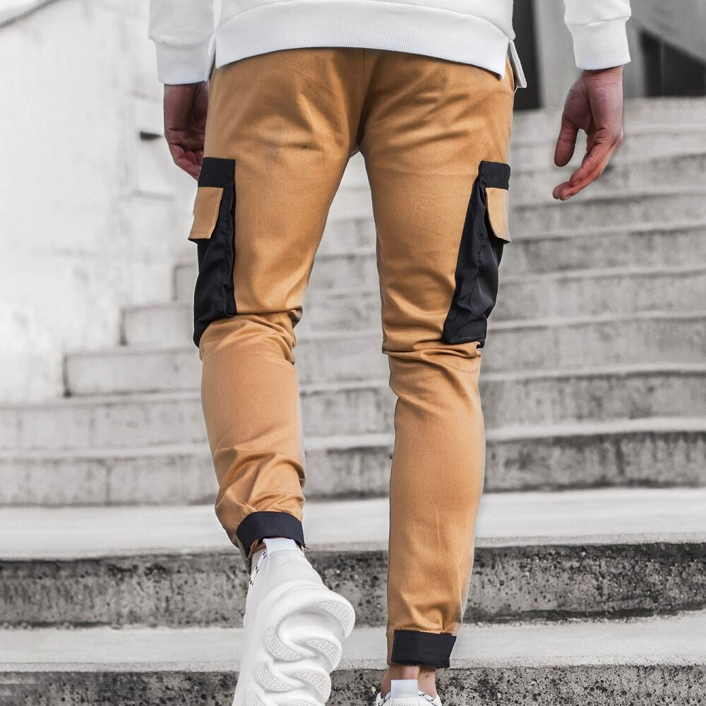Fashionable men's jogger pants with patch pockets, perfect for casual streetwear. Comfortable fit in stylish design.
