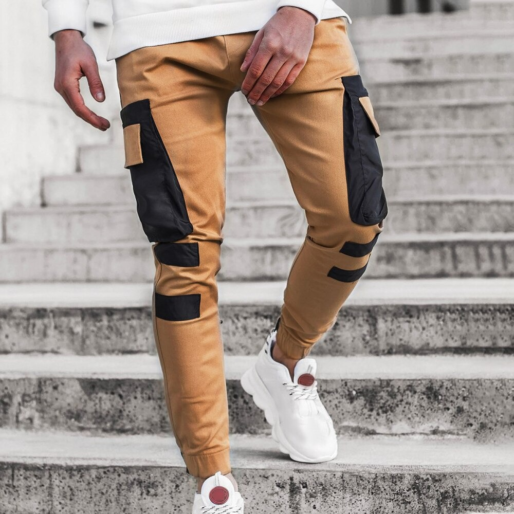 Fashion men's streetwear jogger pants with patch pockets in khaki. Stylish and comfy casual clothing.