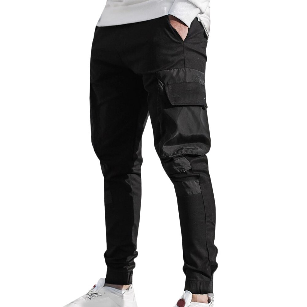 Men's black jogger pants with patch pockets, perfect for casual streetwear and sporty looks.