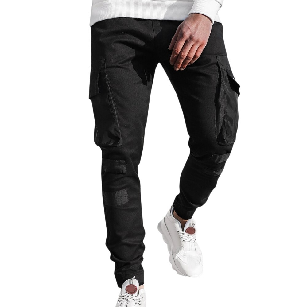 Fashion men's black jogger pants with patch pockets, perfect for casual streetwear style.