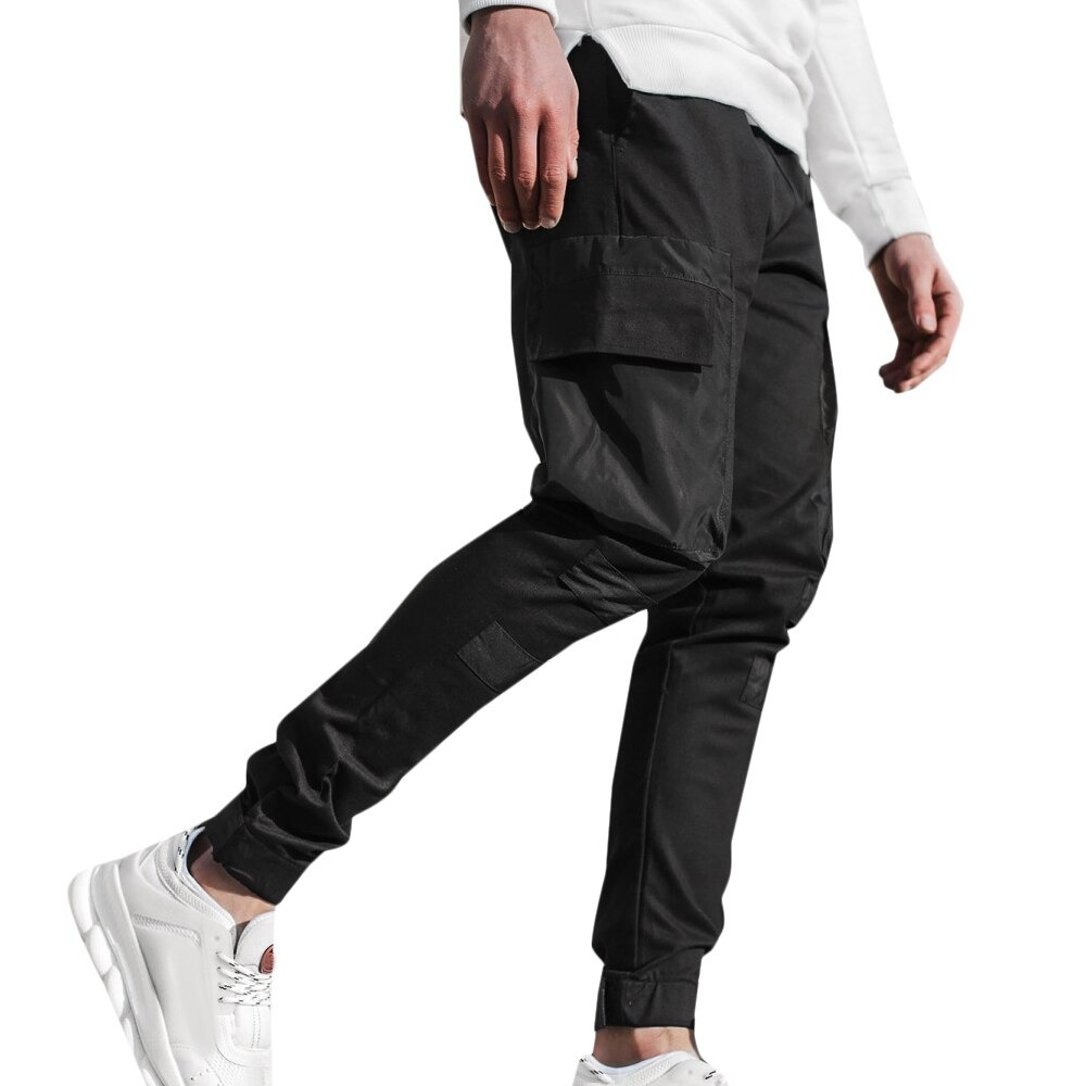 Fashionable men's black joggers pants with patch pockets, perfect for casual streetwear style and comfort.