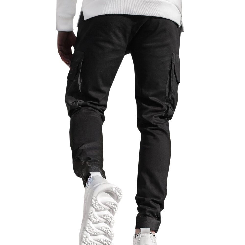 Men's black joggers with patch pockets, stylish and comfy for casual streetwear outfit.