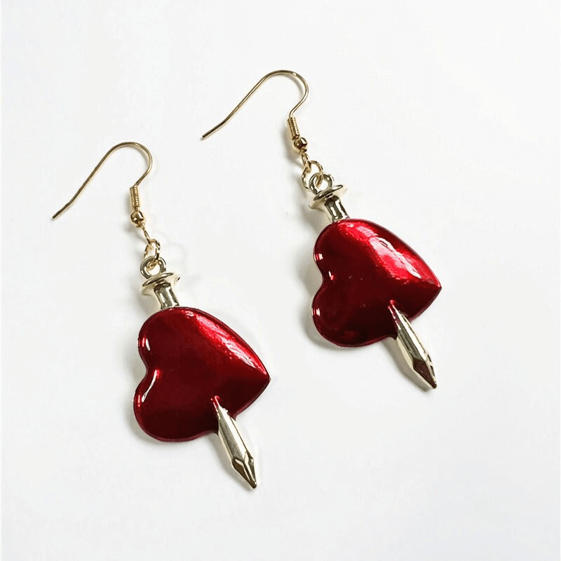 Gothic style red heart earrings with arrow design, perfect for adding flair to your gothic outfits.