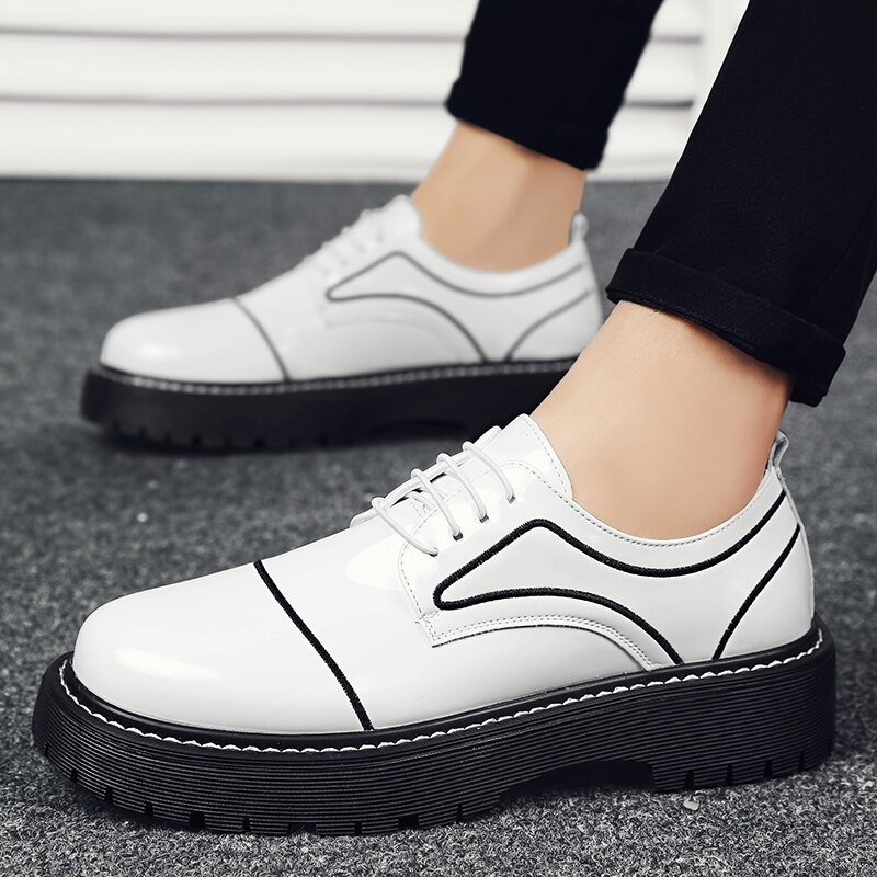 Stylish men's white PU leather oxfords with thick soles, perfect for casual or formal occasions.