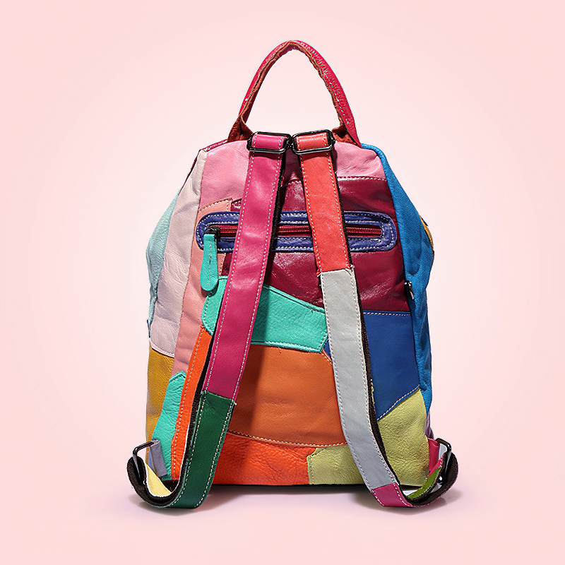 Colorful panelled women's leather backpack with pockets, perfect for edgy outfits and rave events.