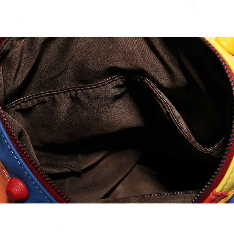 Interior view of a vibrant designer women's backpack with pockets for organization.