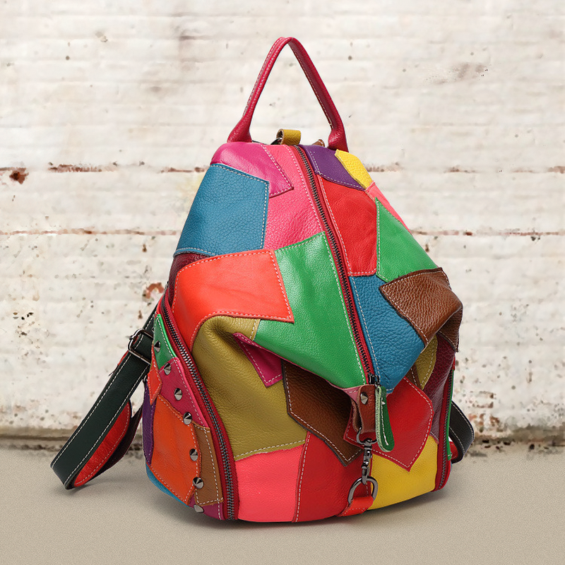 Colorful panelled women's leather backpack with vibrant hues and stylish design, perfect for rave outfits and casual outings.