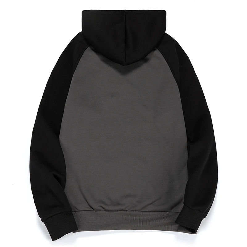 Back view of a men’s fleece patchwork hoodie in black and gray, featuring a cozy hood and stylish design.