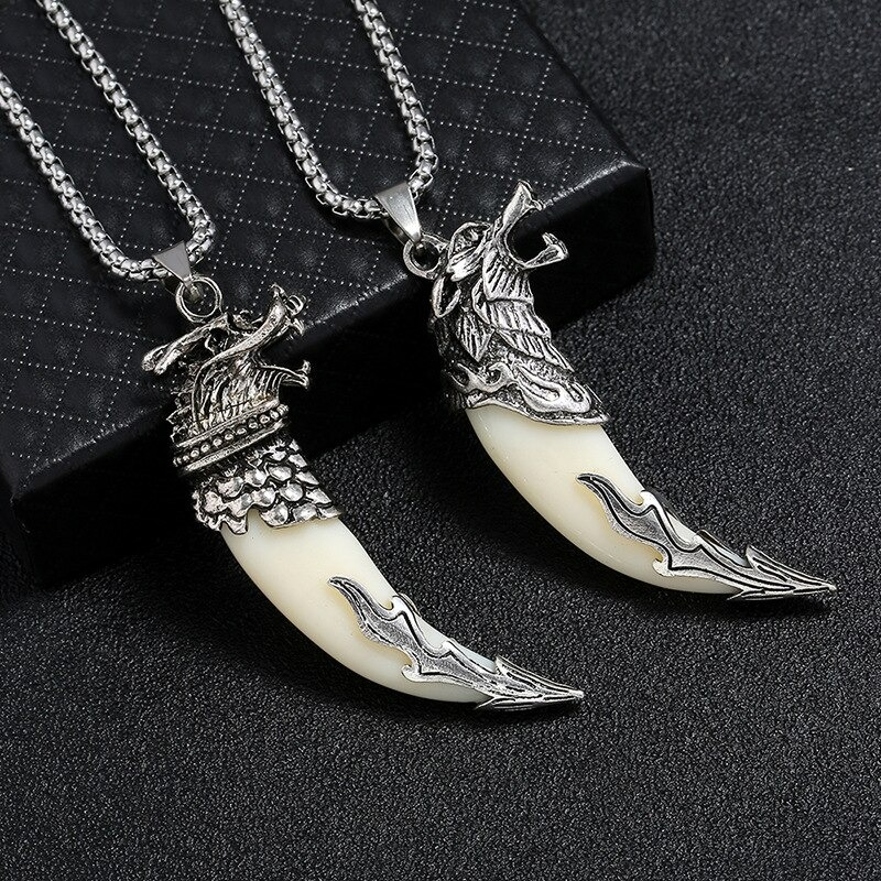 Stylish silver wolf tooth pendant for men and women, featuring a detailed wolf head design, perfect for alternative jewelry lovers.