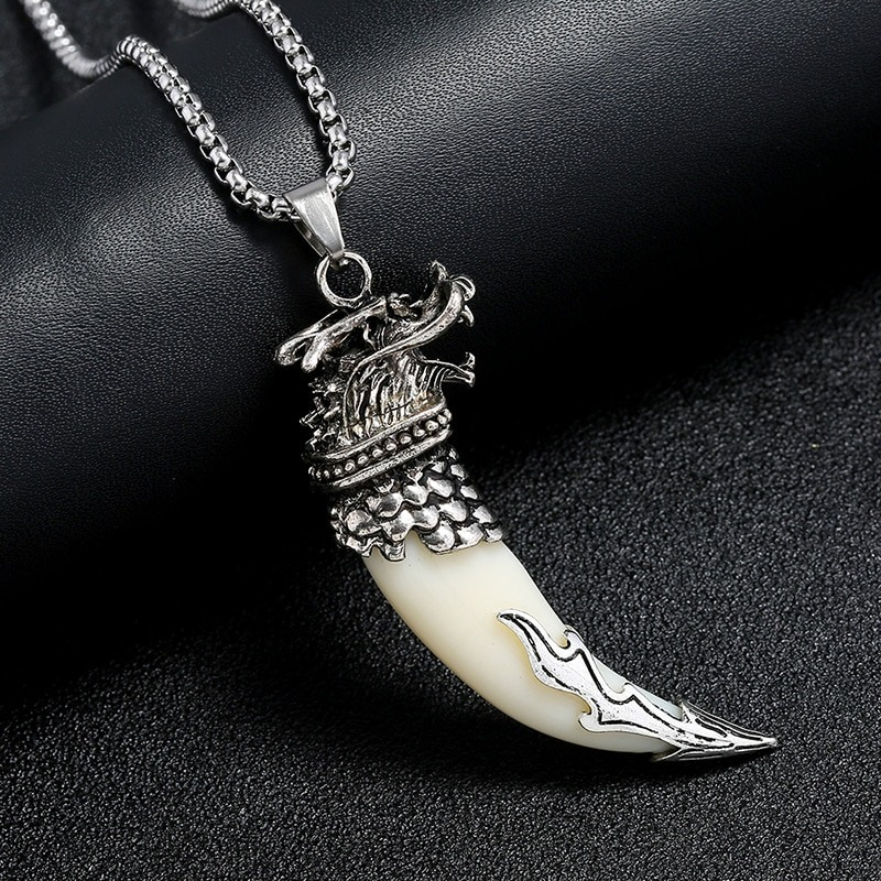 Stylish silver pendant with wolf tooth design, perfect alternative jewelry for men and women.