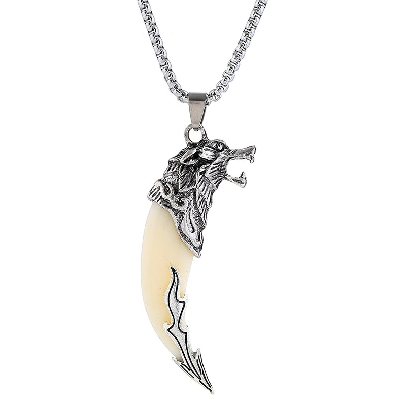 Stylish silver wolf tooth pendant necklace with intricate wolf head design, perfect alternative jewelry for men and women.