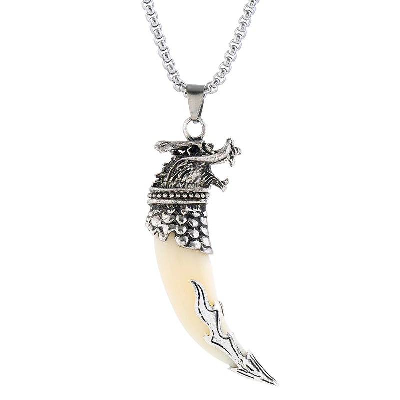 Stylish silver pendant featuring a wolf tooth design with intricate detailing, perfect alternative jewelry for men and women.