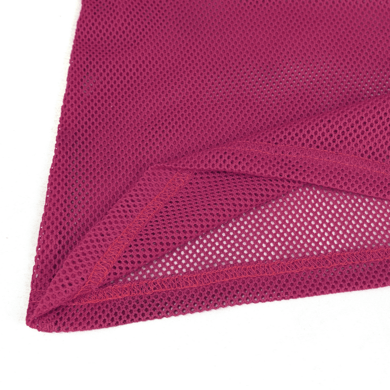 Close-up of pink mesh fabric showing fine mesh texture, ideal for trendy women's long sleeve tops.