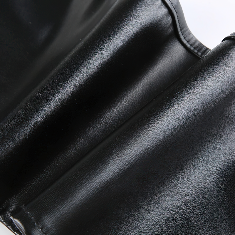 Close-up of shiny black PU leather fabric for a stylish sleeveless tank top or corset crop top.
