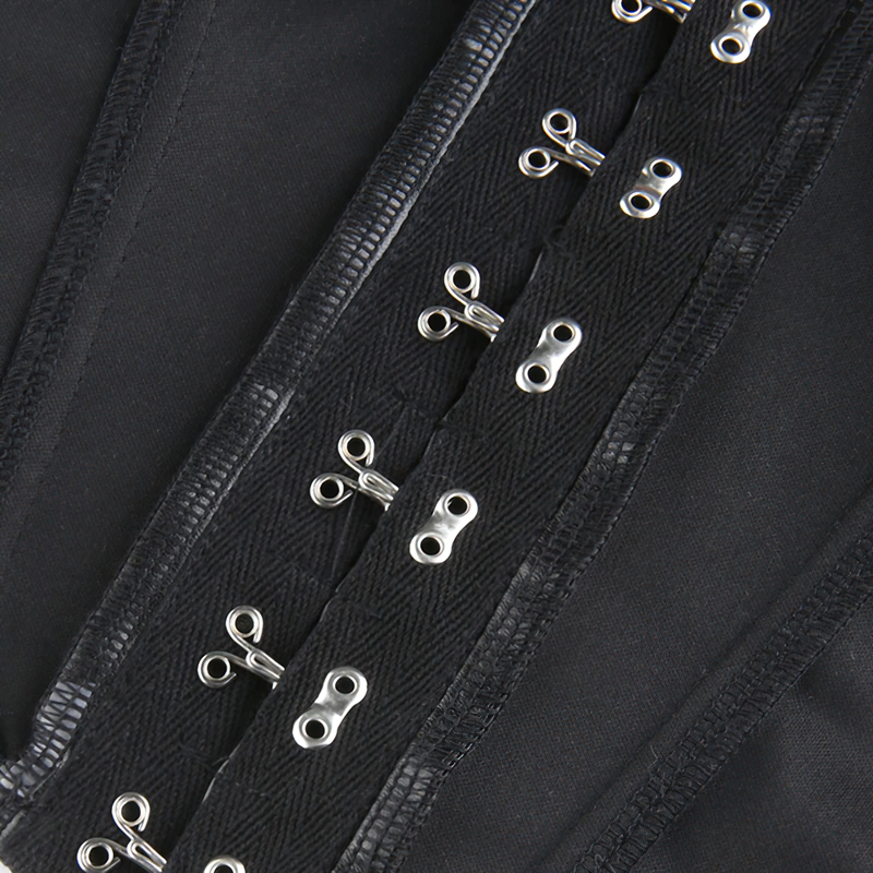 Close-up of black PU leather sleeveless tank top detailing with shiny silver button closures.